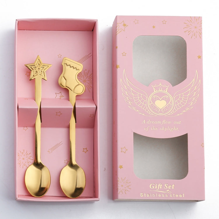 A festive 2pcs stainless steel spoon set featuring Christmas-themed designs including snowmen and gingerbread, perfect for holiday dining.