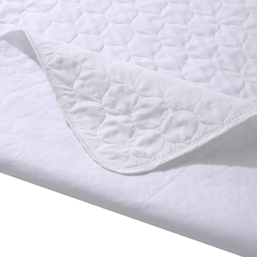 DreamZ Bed Pad, a waterproof and absorbent bed protector, featuring a smooth surface and breathable fabric, ideal for incontinence needs.