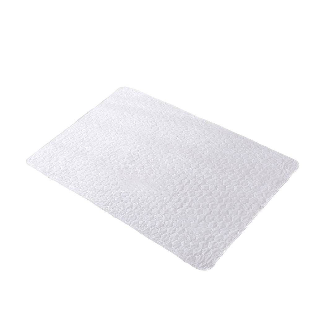 DreamZ Bed Pad, a waterproof and absorbent bed protector in white, designed for comfort and convenience.