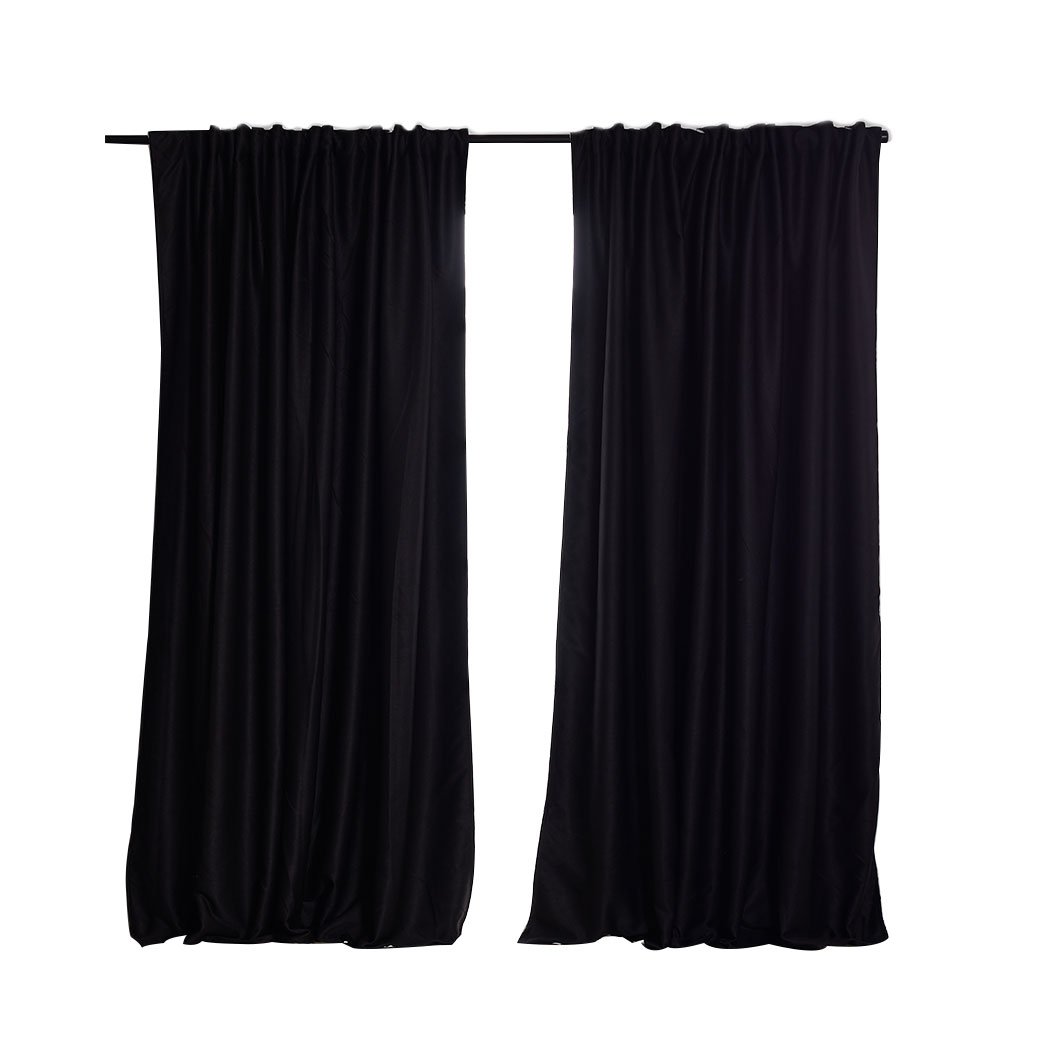 Elegant 2X Blockout Curtains in black, measuring 180cm x 230cm, designed to block sunlight and noise for a serene bedroom atmosphere.