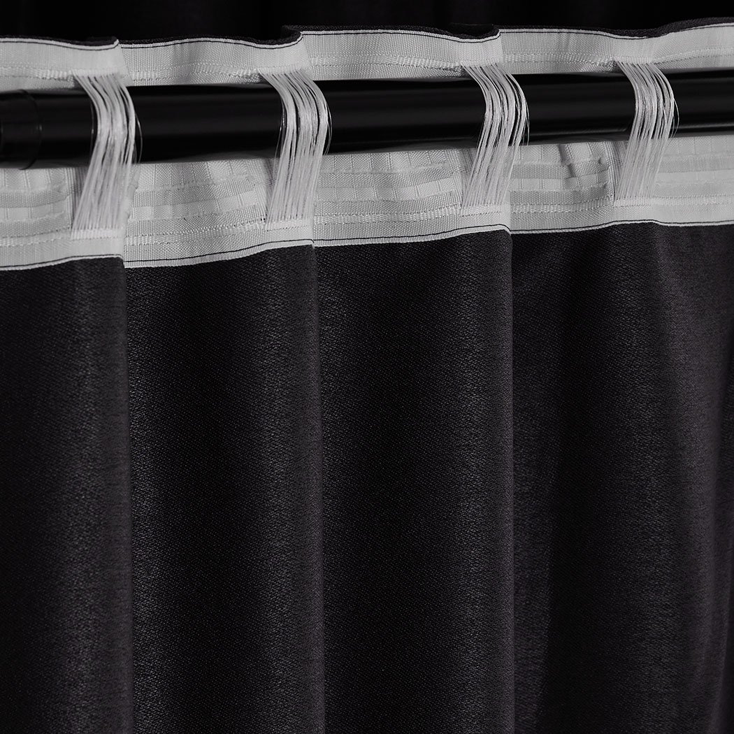 Elegant 2X Blockout Curtains in black, measuring 180cm x 230cm, designed to block sunlight and noise for a serene bedroom atmosphere.