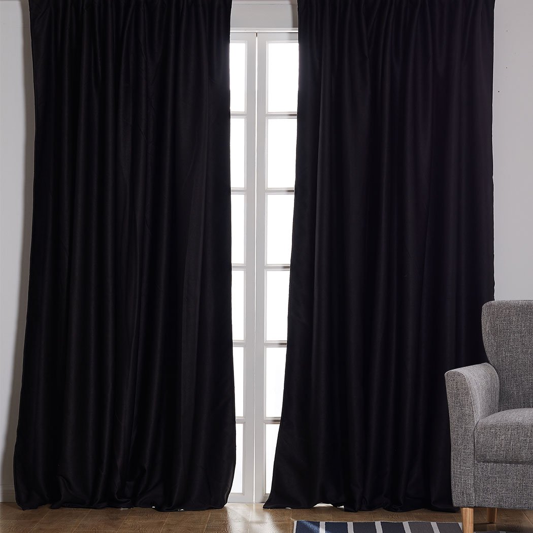 Elegant 2X Blockout Curtains in black, measuring 180cm x 230cm, designed to block sunlight and noise for a serene bedroom atmosphere.