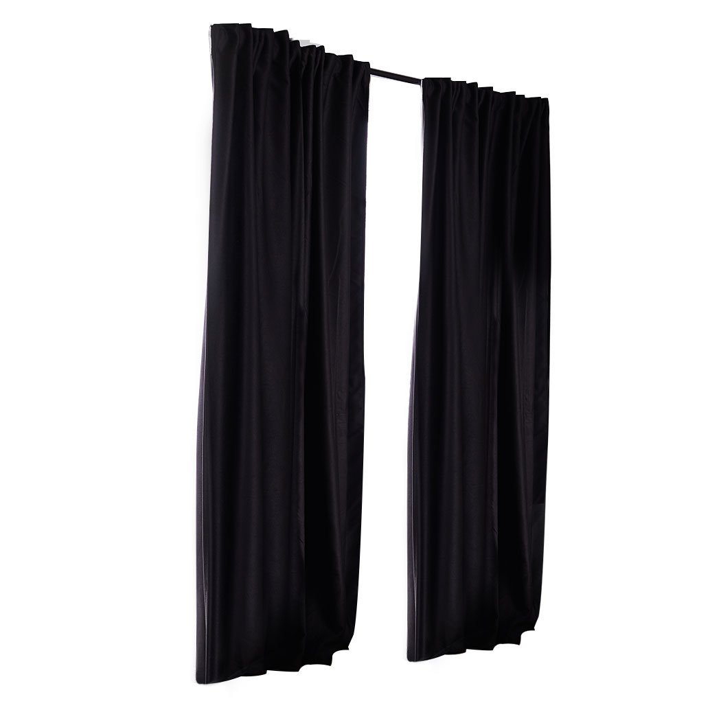 Elegant 2X Blockout Curtains in black, measuring 180cm x 230cm, designed to block sunlight and noise for a serene bedroom atmosphere.