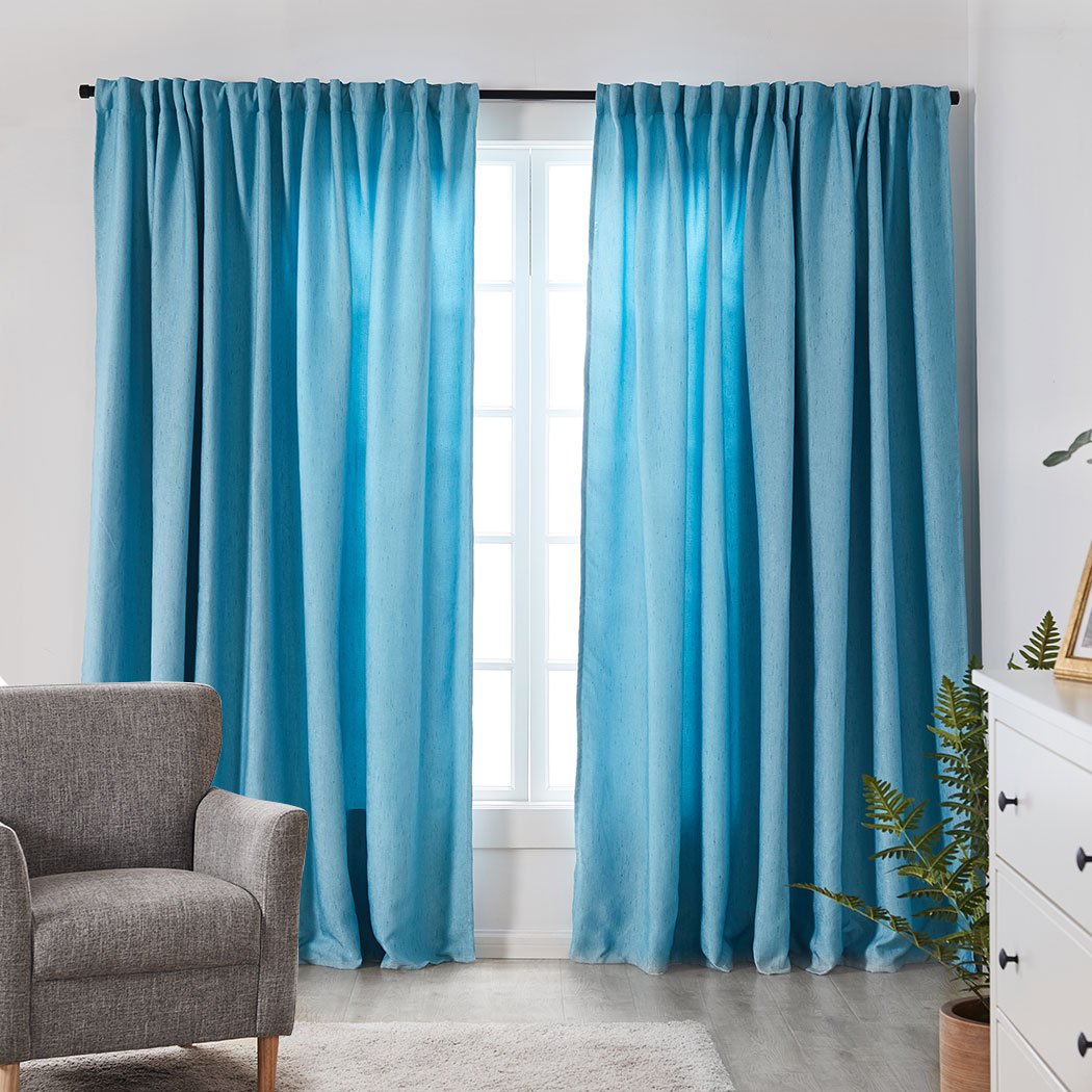 Elegant blue 2X blockout curtains designed for living room windows, measuring 180CM x 230CM, effectively blocking sunlight and noise.