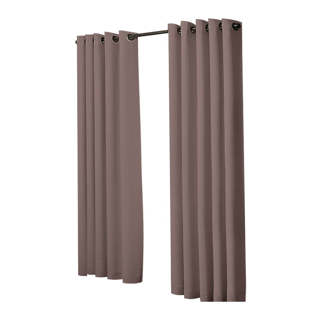 Two elegant blockout curtain panels in vibrant color, designed for room darkening and noise insulation, featuring eyelet design and triple weave fabric.