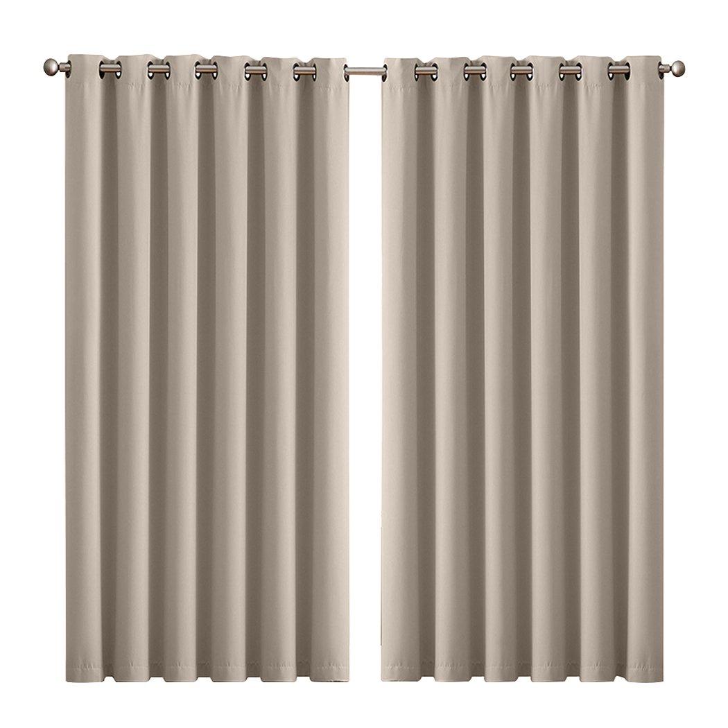 Two elegant blockout curtain panels in vibrant color, designed for room darkening and noise insulation, featuring eyelet design and triple weave fabric.