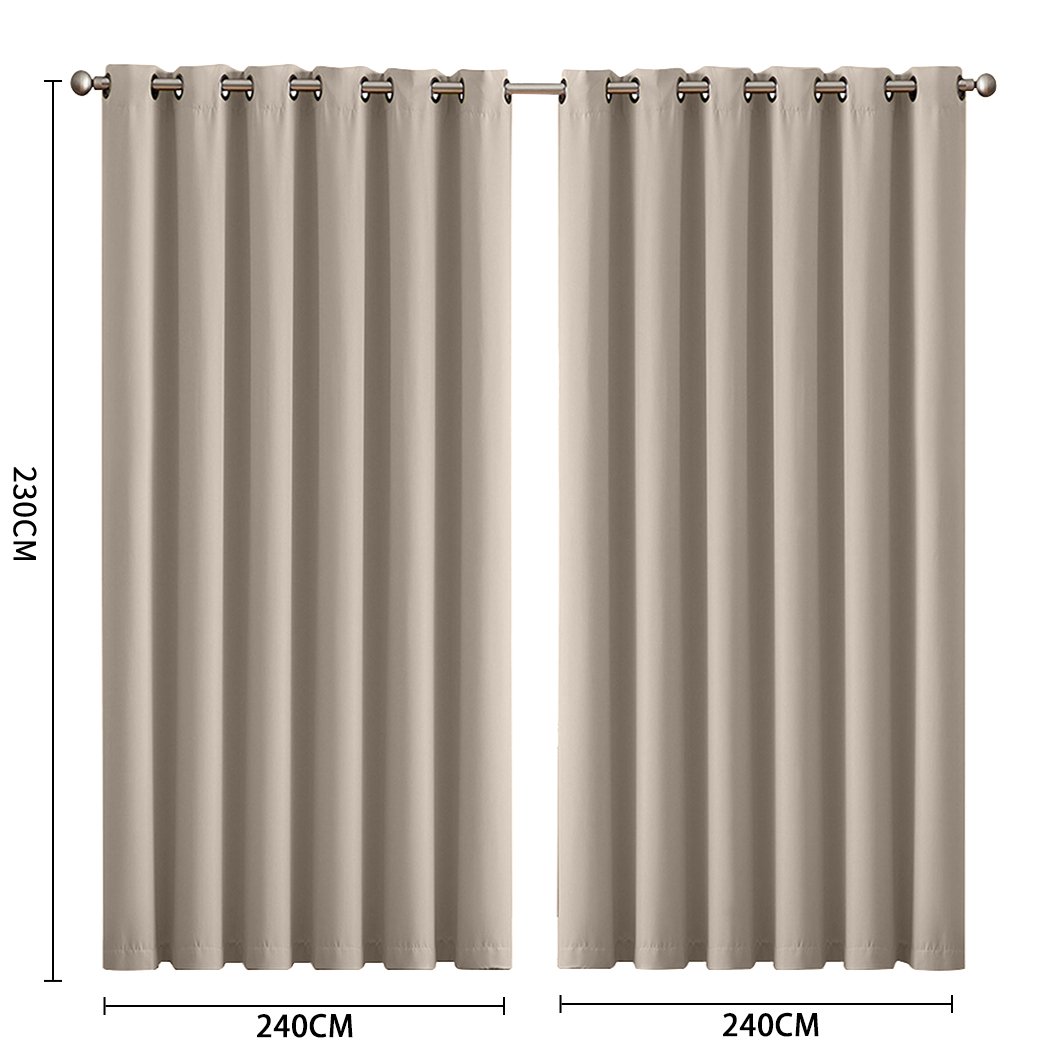 Two elegant blockout curtain panels in vibrant color, designed for room darkening and noise insulation, featuring eyelet design and triple weave fabric.