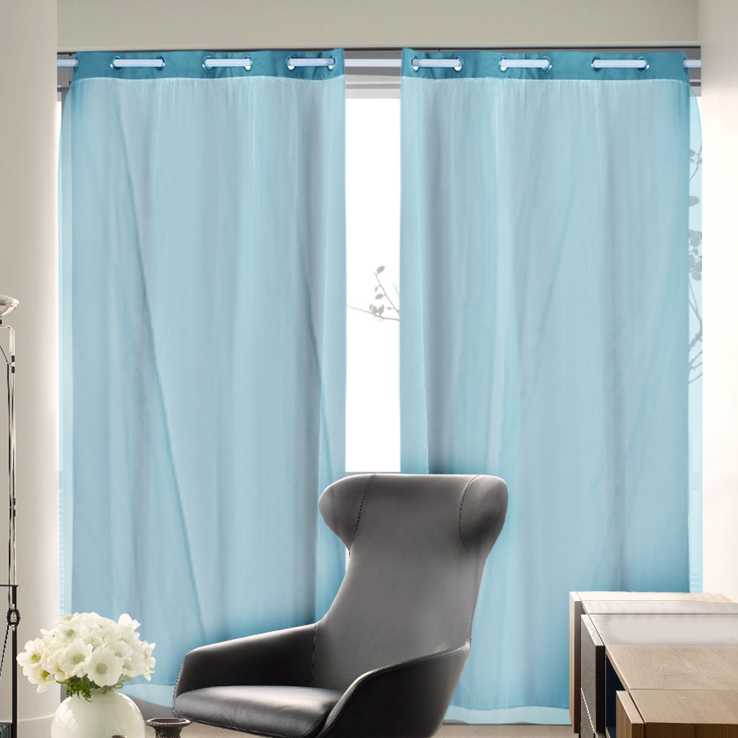 Two elegant blockout curtain panels with gauze, showcasing a modern grommet top design, perfect for darkening any room.