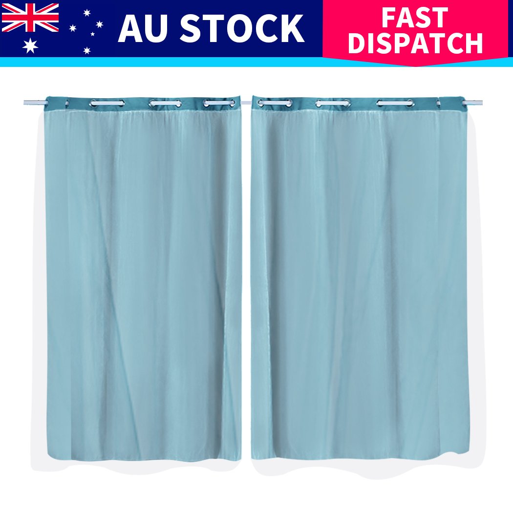 Two elegant blockout curtain panels with gauze, showcasing a modern grommet top design, perfect for darkening any room.