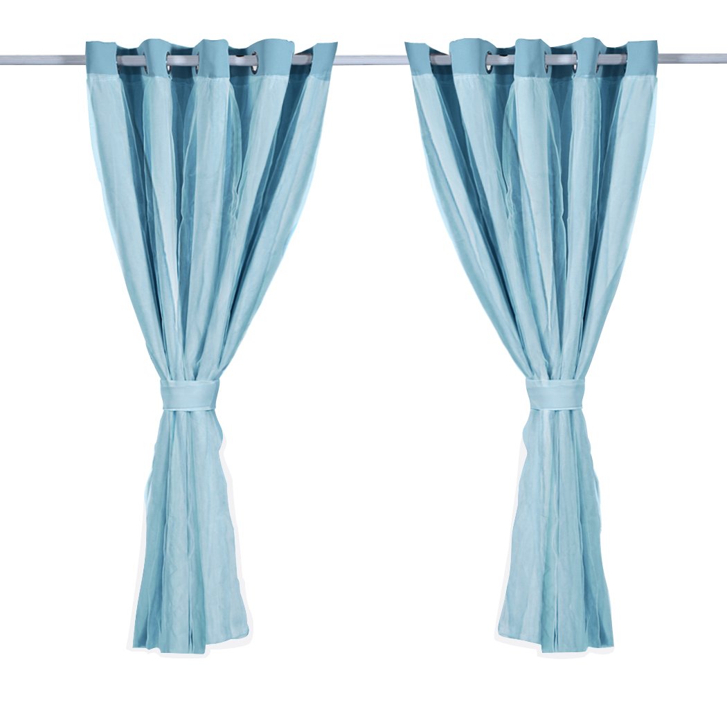 Two elegant blockout curtain panels with gauze, designed for maximum light control and stylish draping in a modern interior.