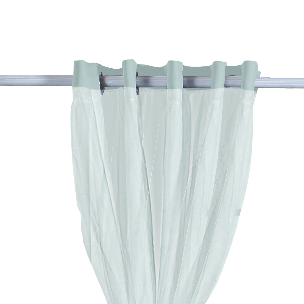 Two elegant blockout curtain panels with gauze, showcasing a 3-layer design for room darkening, hanging on a curtain rod.