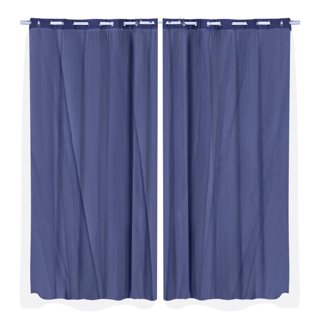 Two elegant blockout curtain panels with gauze, showcasing a stylish design for room darkening.