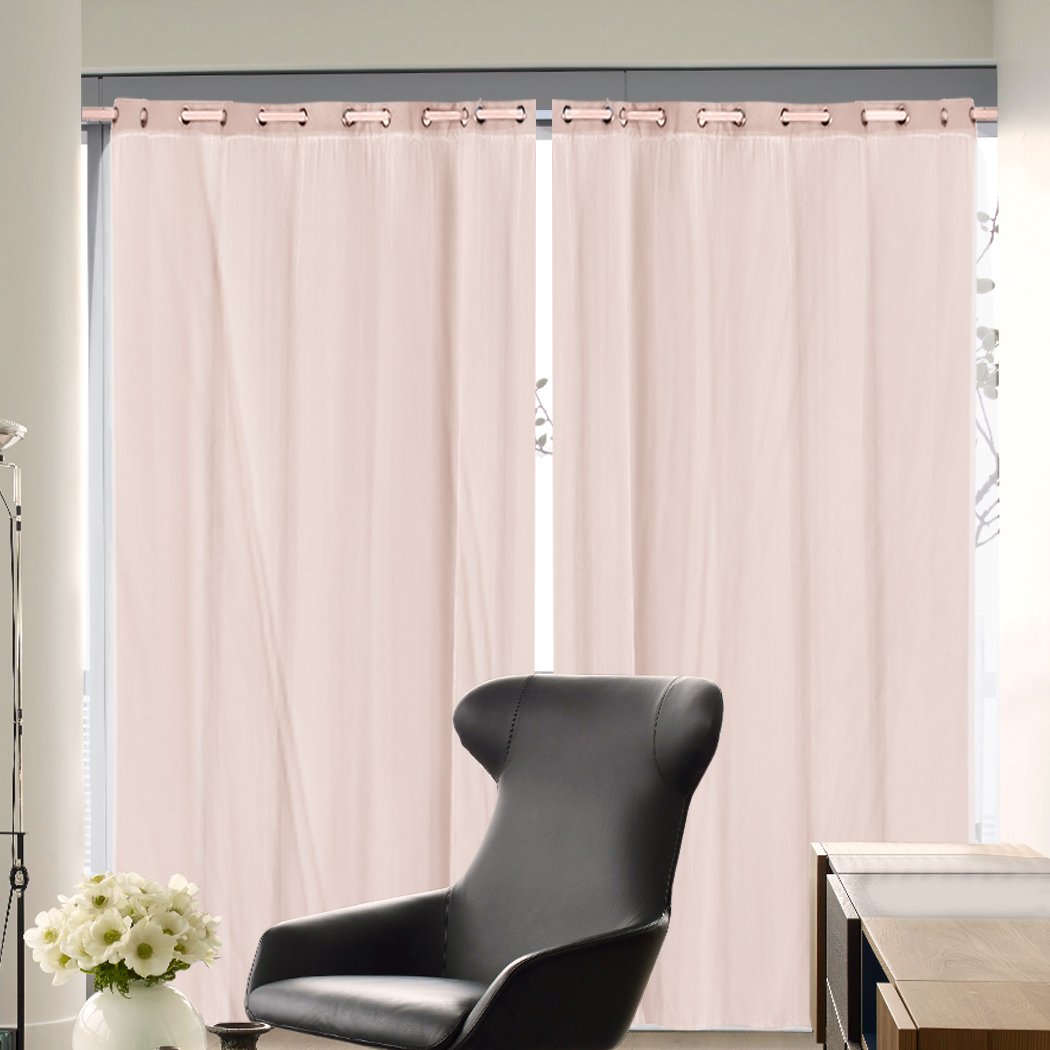 Two elegant blockout curtain panels with gauze, showcasing a stylish design and grommet top for easy hanging.