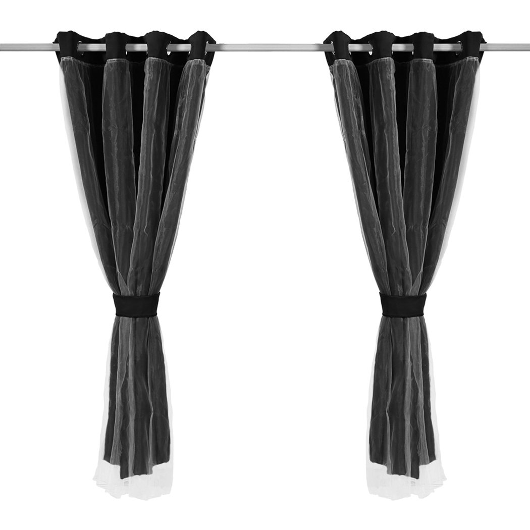 Two elegant blockout curtain panels with gauze, showcasing a 3-layer design for effective room darkening.