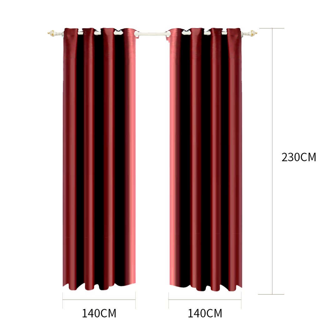 Two elegant blockout curtain panels with eyelet design, showcasing a rich color and luxurious texture, perfect for room darkening and noise insulation.