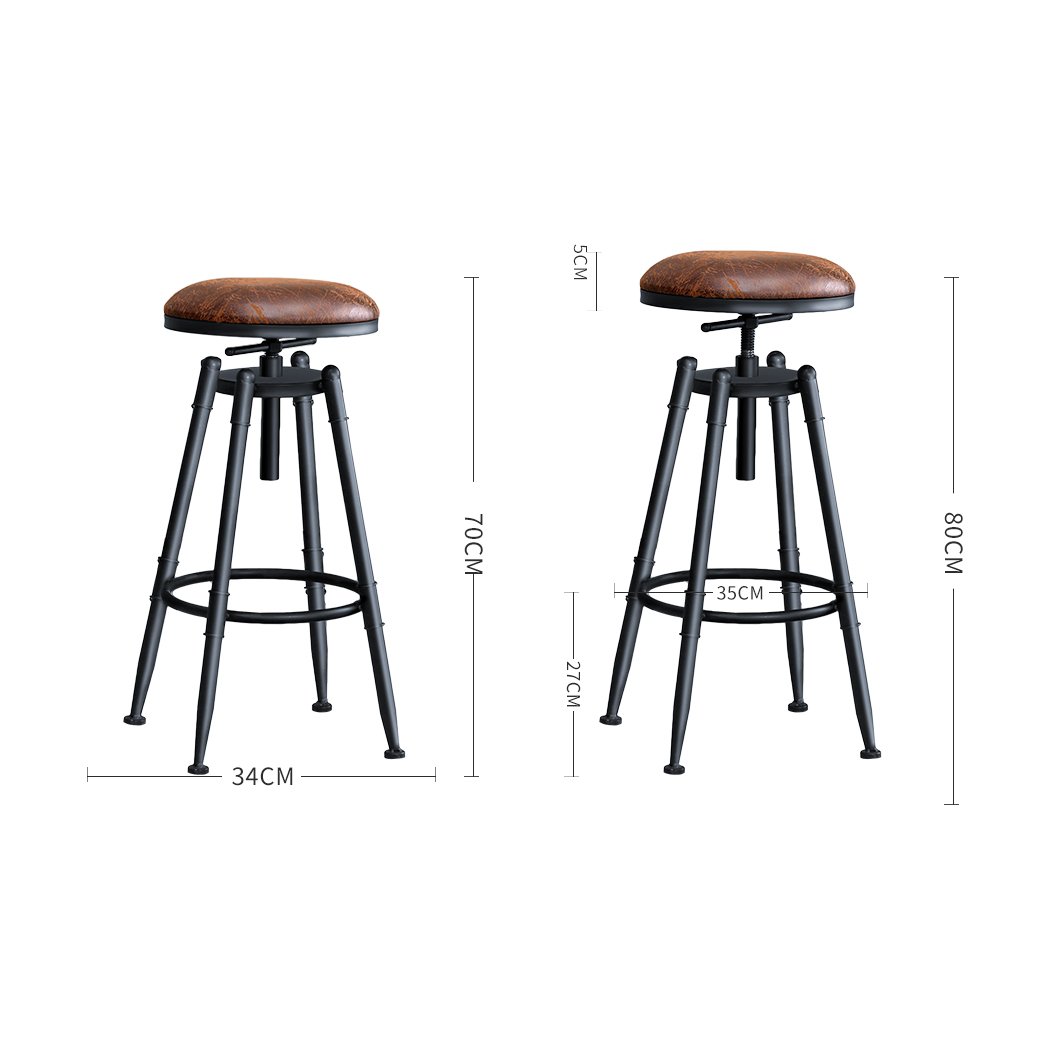 Two Levede Rustic Industrial Bar Stools with a vintage design, featuring a soft PU seat and heavy-duty steel frame, perfect for kitchens and dining areas.