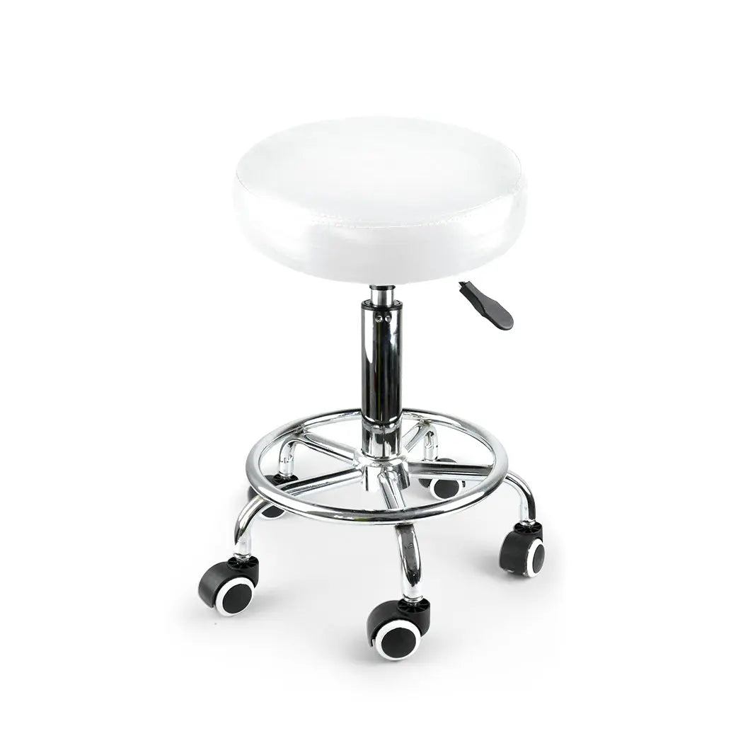 Two Levede swivel salon barstools with white PU leather cushions and silver chromed iron bases, showcasing their elegant design and functionality.