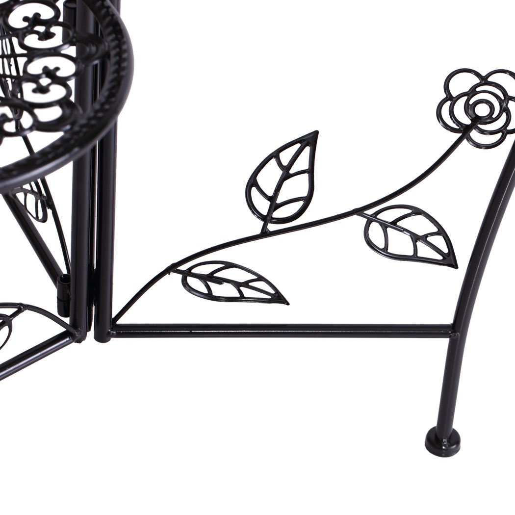 Two elegant wrought iron plant stands designed for indoor and outdoor use, featuring a delicate imitation rattan design and sturdy construction.