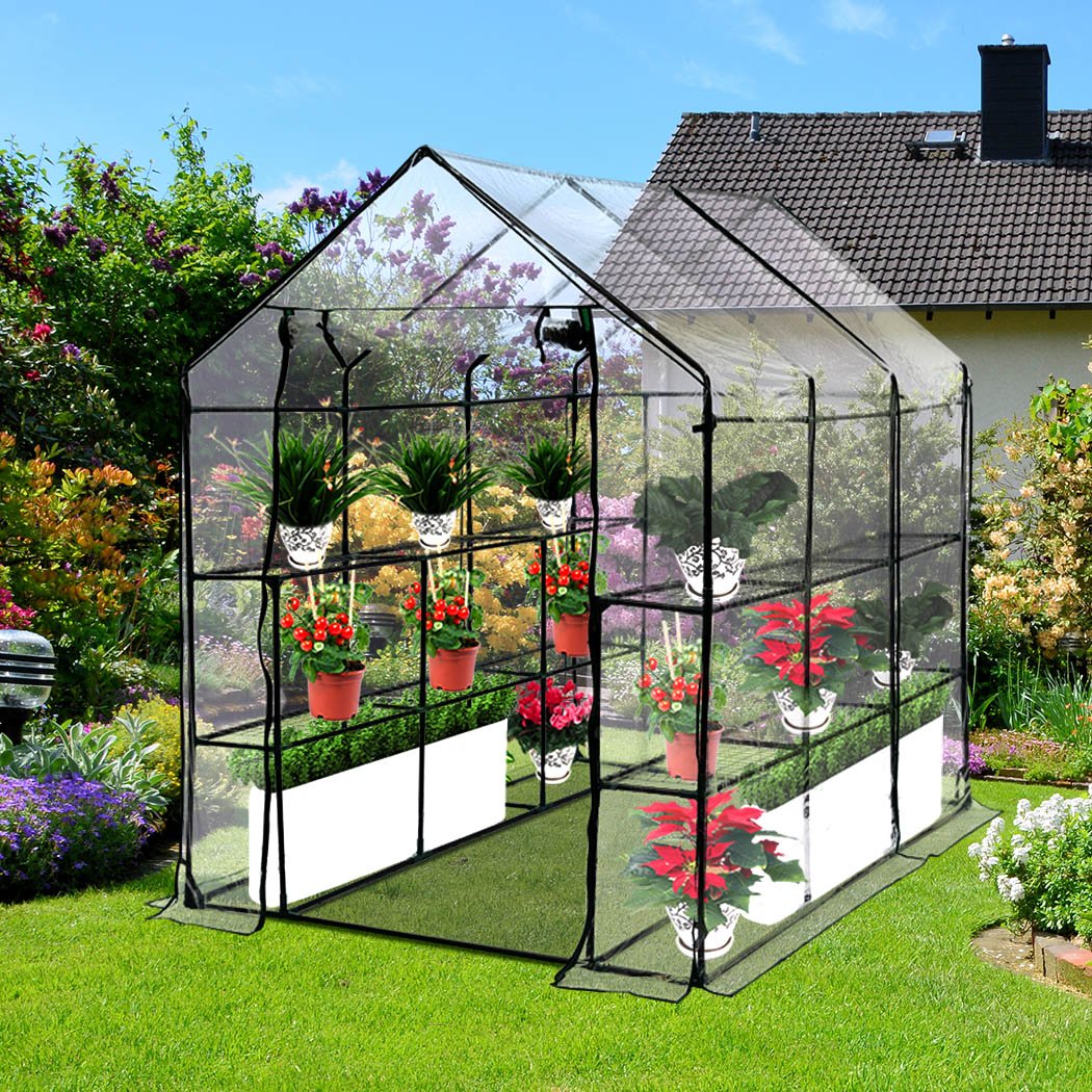 3 Tier Walk In Greenhouse with PVC cover, showcasing a sturdy steel frame and transparent design for plant protection.