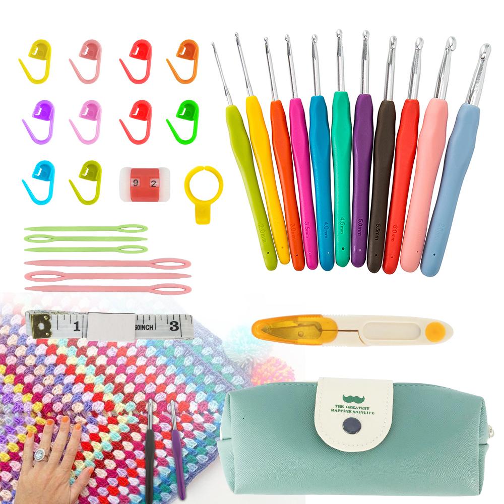 30 Pcs Crochet Hooks Kit with colorful ergonomic handles and PU leather storage bag, including various sewing tools.