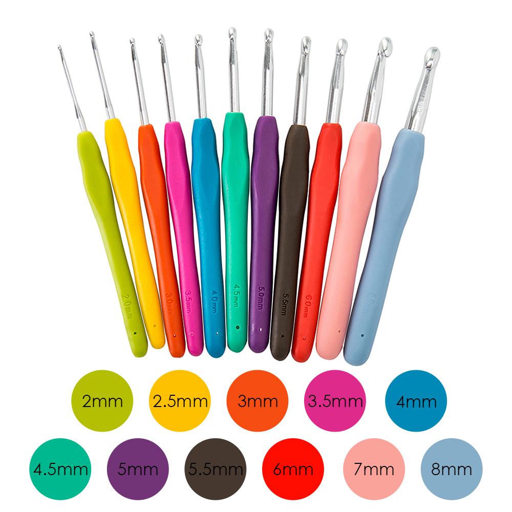 30 Pcs Crochet Hooks Kit with colorful ergonomic handles and PU leather storage bag, including various sewing tools.