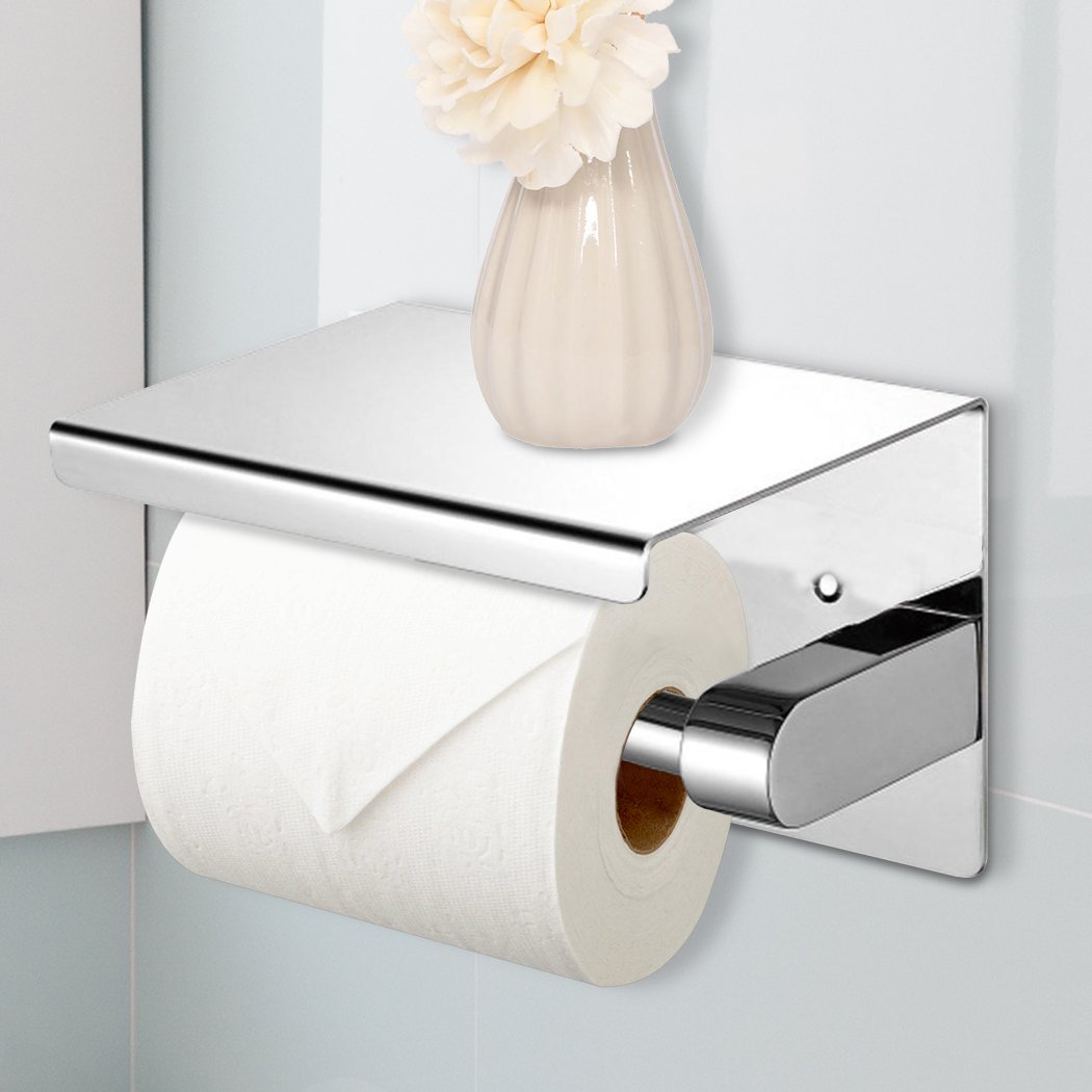 304 Stainless Steel Toilet Paper Roll Holder with a mirror finish, mounted on a wall, showcasing its sleek design and durability.