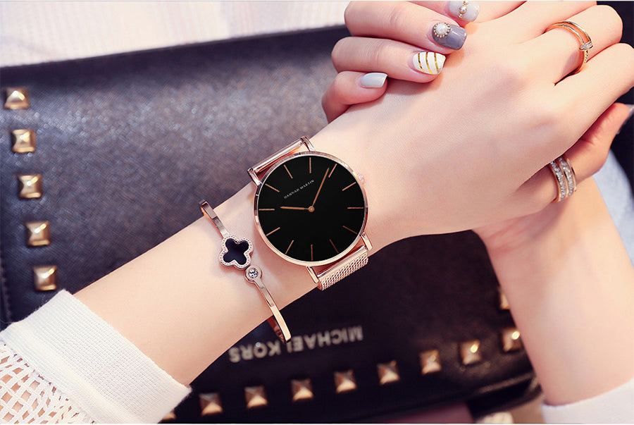 36mm Full Black Japan Quartz Movement luxury women's wristwatch with stainless steel band and round case.