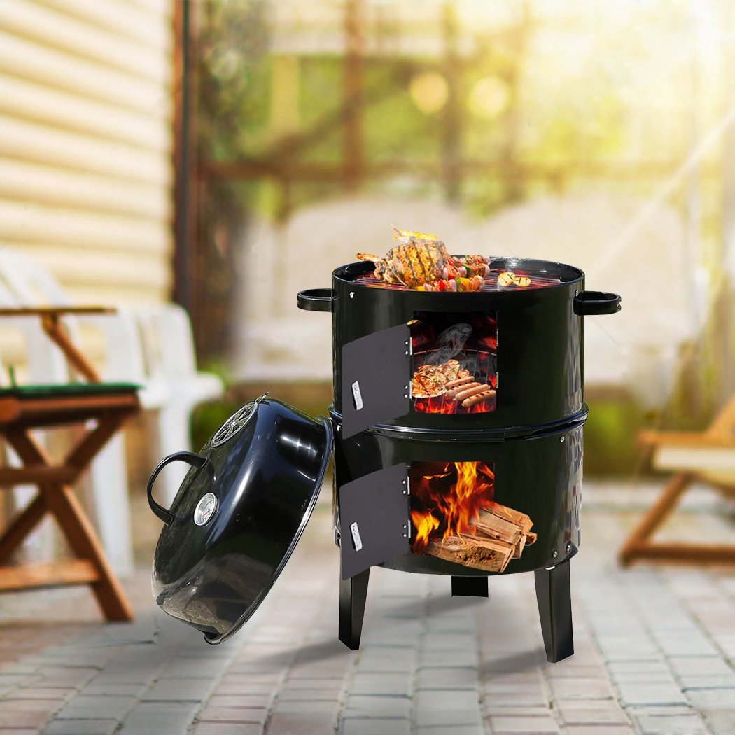 3in1 Charcoal BBQ Grill Smoker in black steel, showcasing its portable design and multiple cooking features.