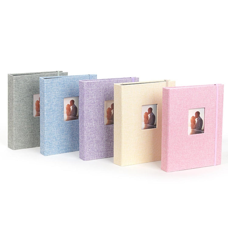 3-inch purple cotton linen photo album with 208 pockets for photos and tickets, featuring a stylish hollow cover and strap design.