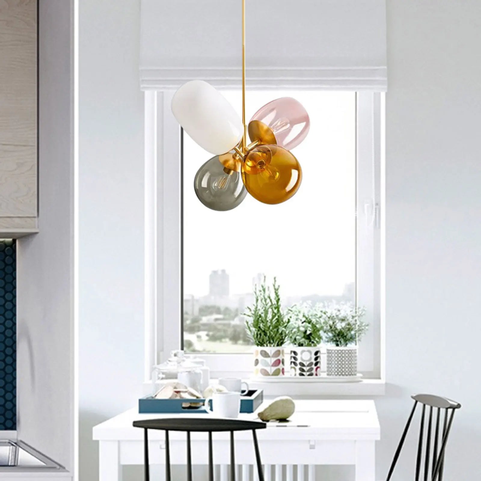 A colorful LED balloon chandelier featuring vibrant glass balls, perfect for children's rooms and stylish interiors.