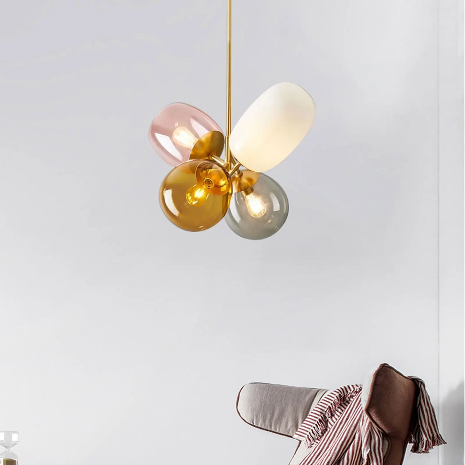 A colorful LED balloon chandelier featuring vibrant glass balls, perfect for children's rooms and stylish interiors.