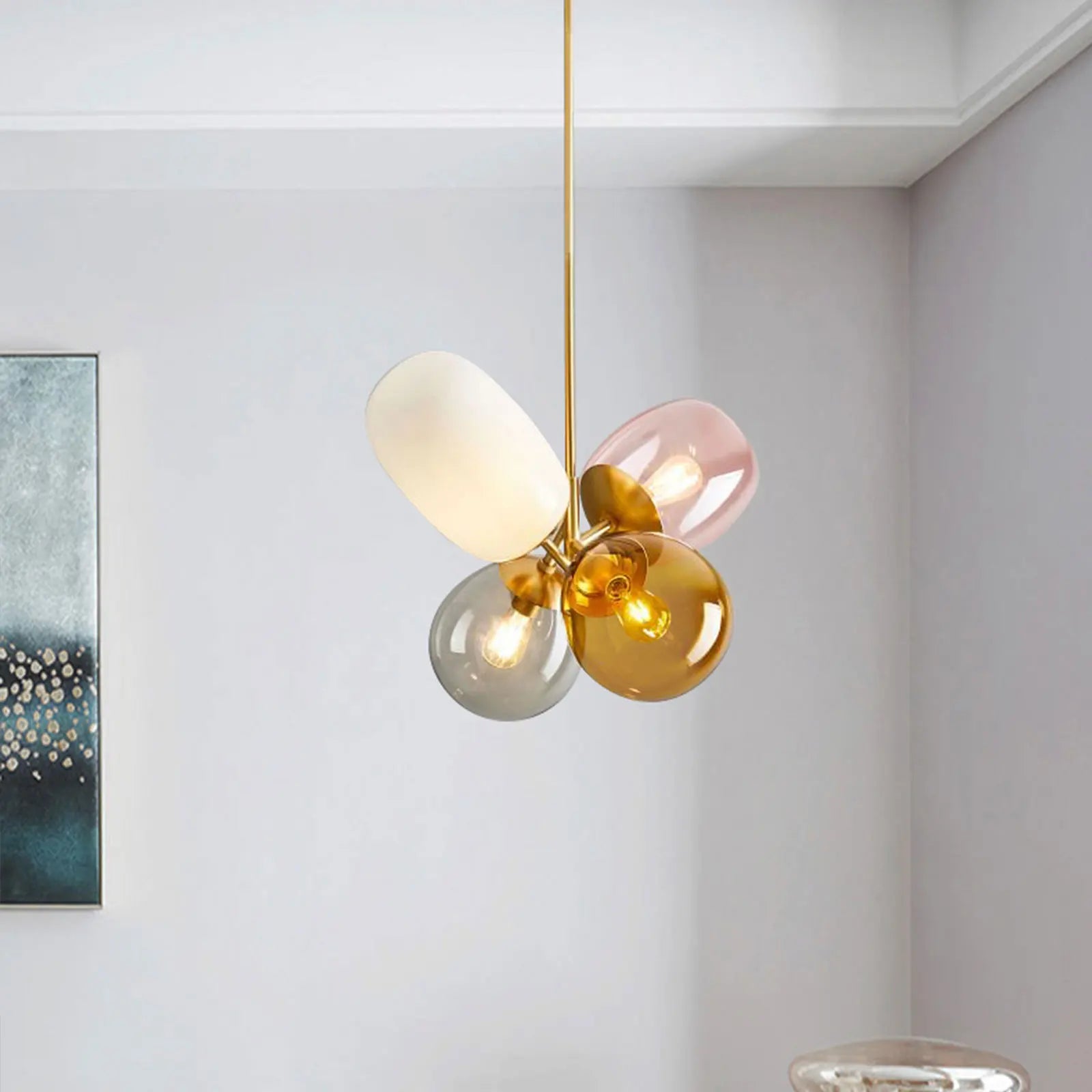 A colorful LED balloon chandelier featuring vibrant glass balls, perfect for children's rooms and stylish interiors.