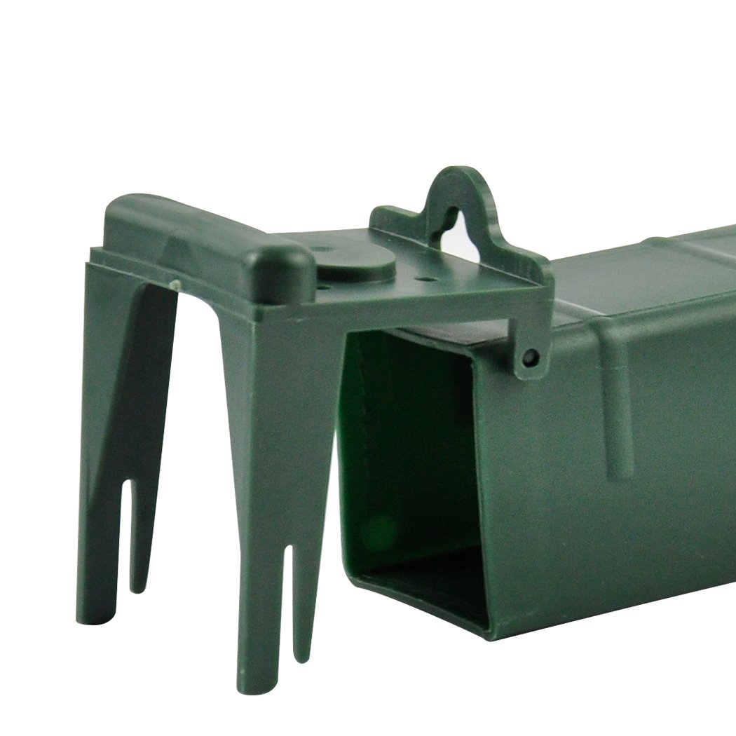 Four green reusable mouse traps designed for safe live capture of rodents, featuring a touch-and-catch mechanism.