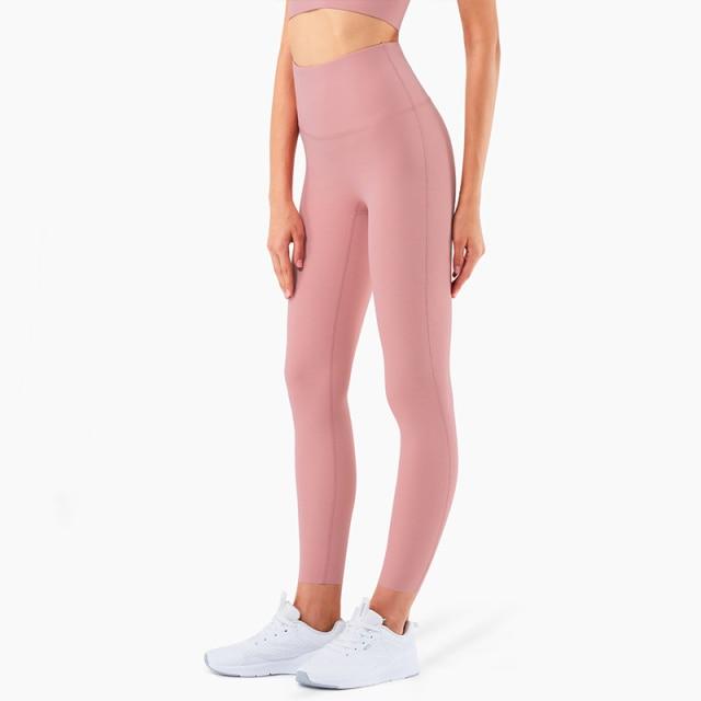 Women wearing 4 Way Stretch Naked Feel Athletic Leggings in a gym setting, showcasing high waist design and flexibility.