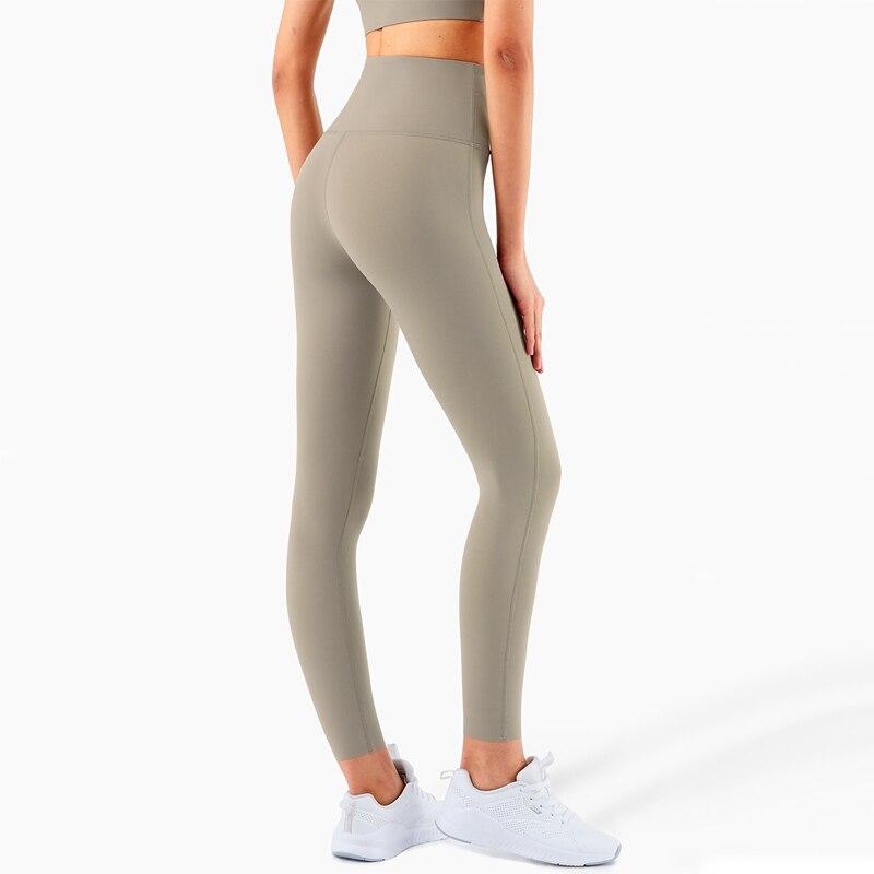 Women wearing 4 Way Stretch Naked Feel Athletic Leggings in a gym setting, showcasing high waist design and flexibility.