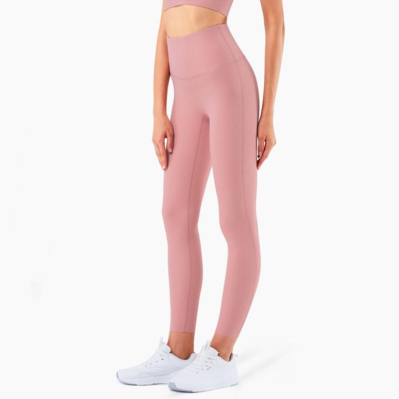 Women wearing 4 Way Stretch Naked Feel Athletic Leggings in a gym setting, showcasing high waist design and flexibility.