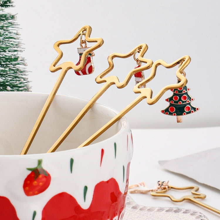 4pcs Christmas stainless steel spoon and fork set with star pendant design, elegantly displayed in a gift box.