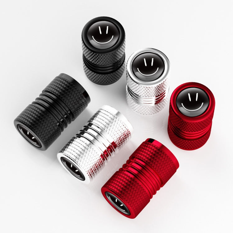 Set of 4 Smile Metal Tire Valve Caps in aluminum alloy, showcasing their vibrant design and durable construction.