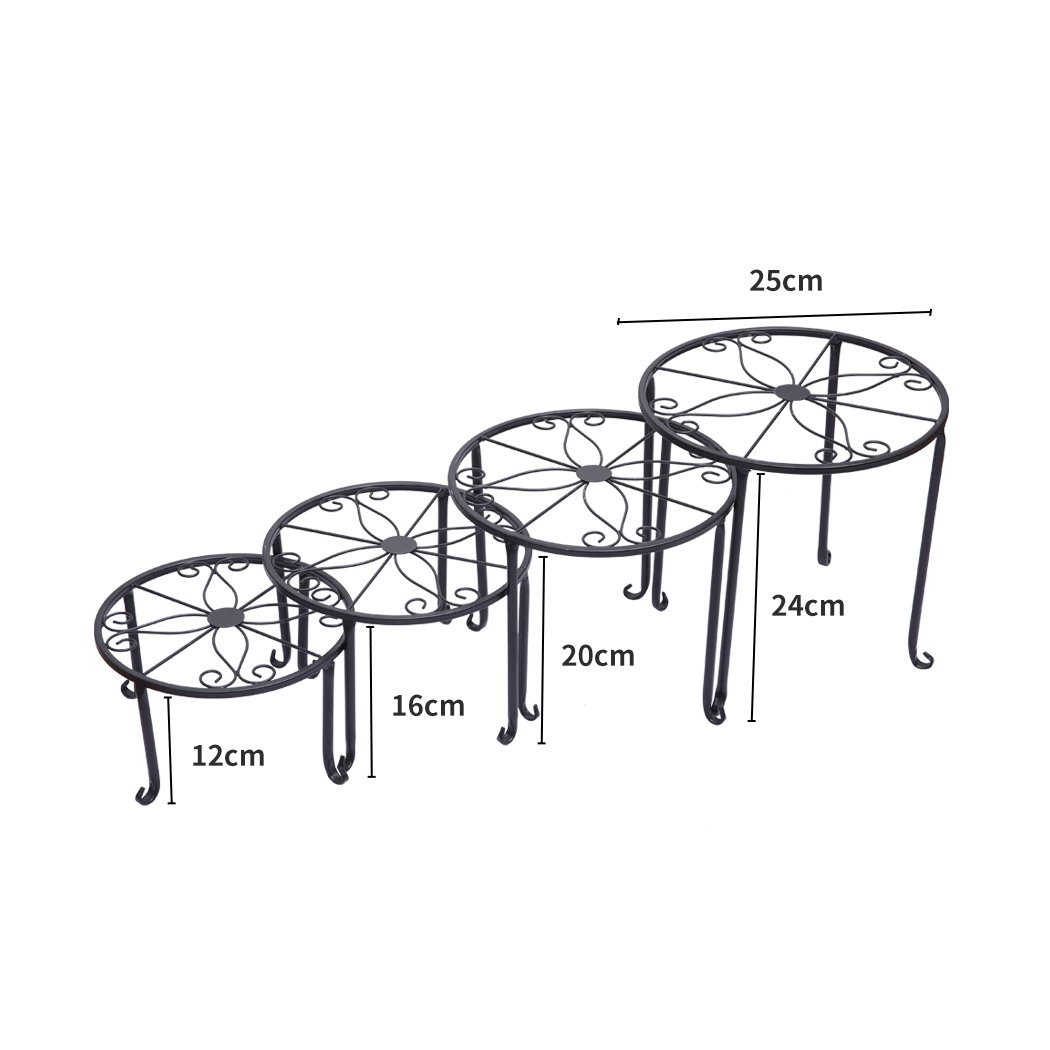 Four black metal plant stands arranged with various flower pots, showcasing an elegant outdoor and indoor decor.