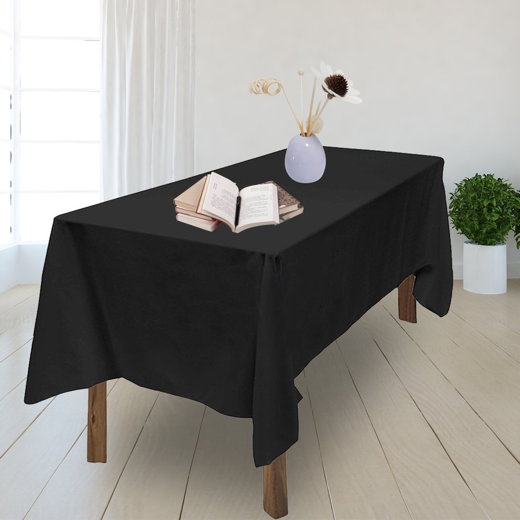 Set of four elegant black and white polyester tablecloths designed for weddings and events, fitting various table shapes.