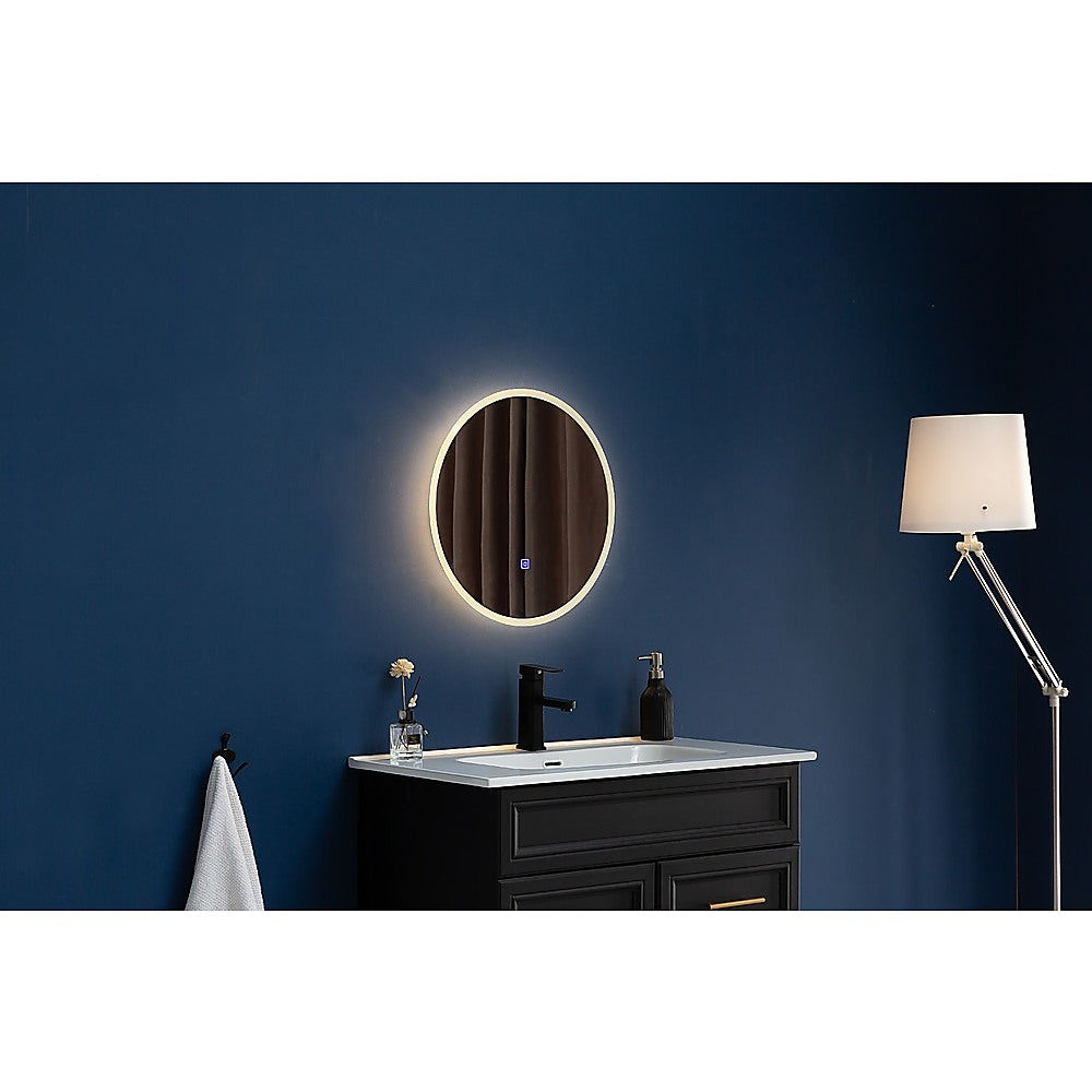 50cm round LED wall mirror with fog-resistant technology and adjustable lighting, perfect for bathroom decor.