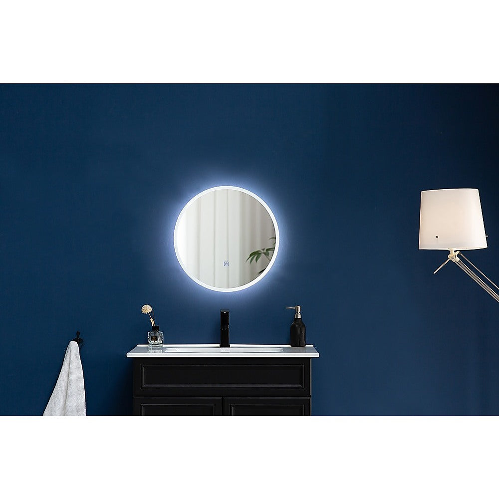 50cm round LED wall mirror with fog-resistant technology and adjustable lighting, perfect for bathroom decor.