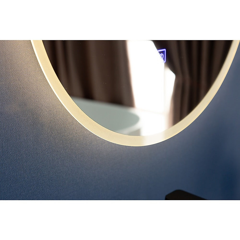 50cm round LED wall mirror with fog-resistant technology and adjustable lighting, perfect for bathroom decor.