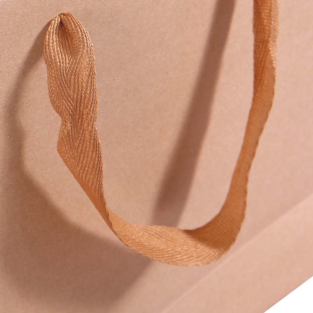 A stack of 50 brown kraft paper bags with twisted cotton handles, ideal for gifts and shopping.