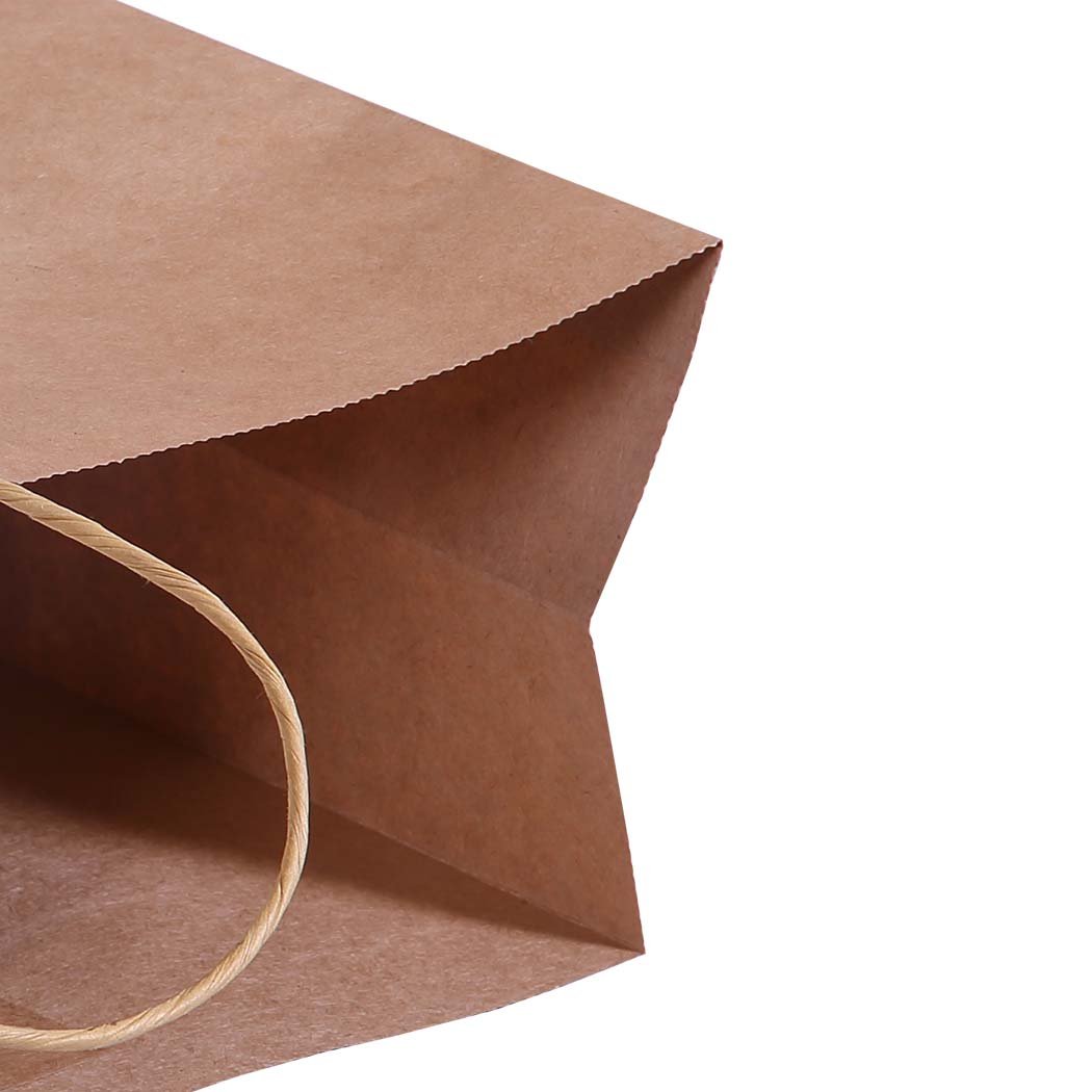 A stack of 50 eco-friendly brown paper bags with twisted hemp cord handles, showcasing their sturdy design and recyclable material.