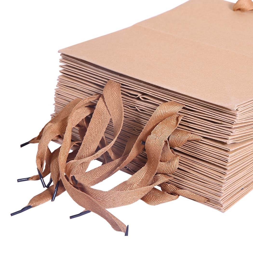 A stack of 50 brown kraft paper bags with twisted handles, showcasing their eco-friendly design and versatility for gifts and retail use.