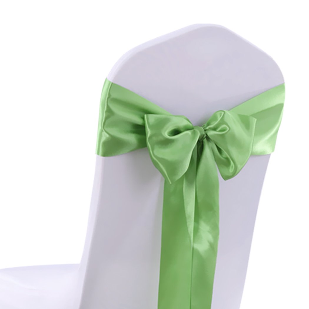 50 satin chair sashes in various colors elegantly draped over chairs for event decoration.