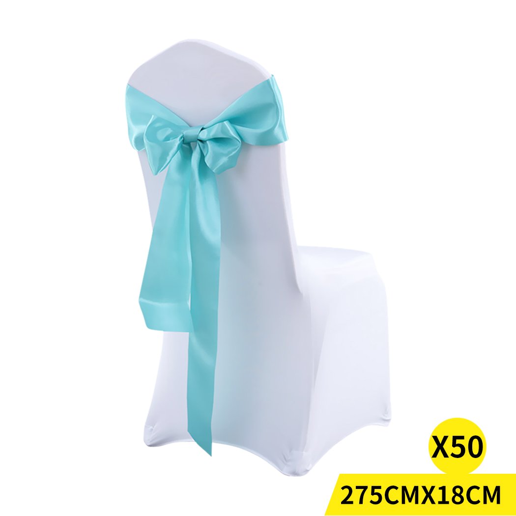 50 satin chair sashes in various colors, elegantly draped over chairs for event decoration.