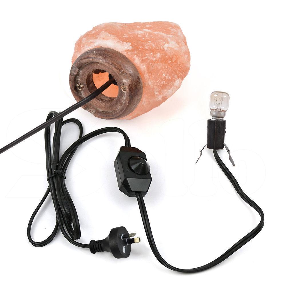 5-7 kg Himalayan salt lamp with natural light dimmer switch, showcasing its warm glow and unique crystal structure.