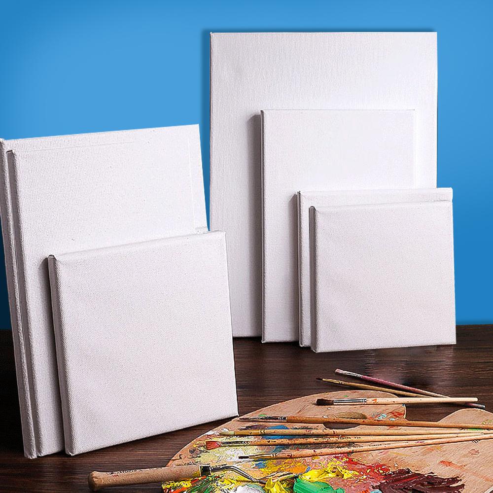 Five blank artist stretched canvases stacked together, showcasing a sturdy frame and primed surface for oil and acrylic painting.